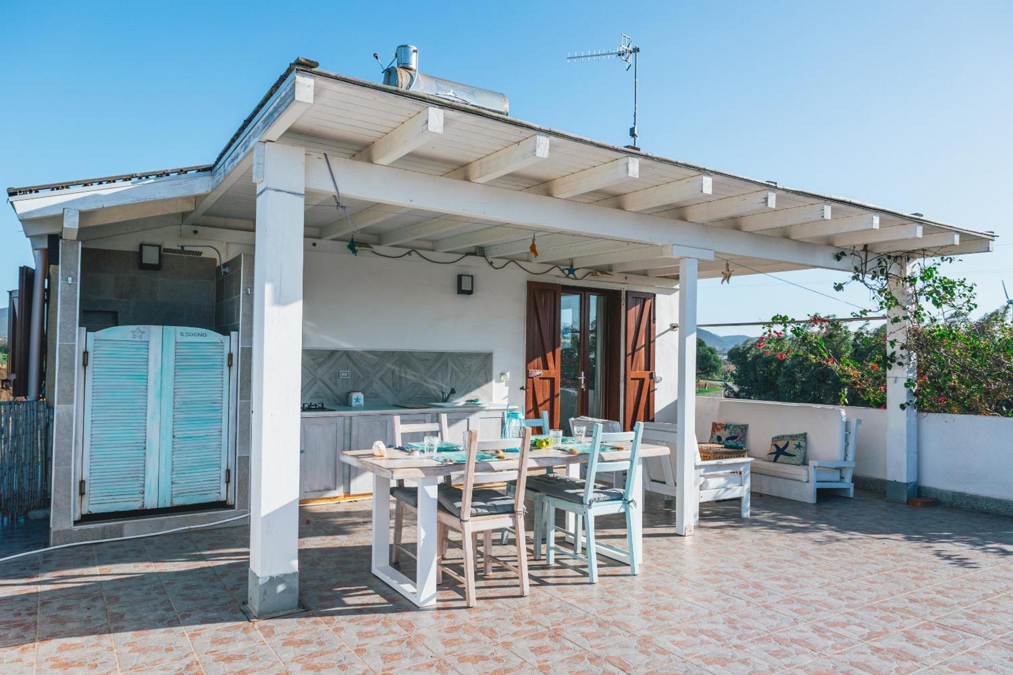 Case Vacanze Il Sogno Porto Pino Exterior photo