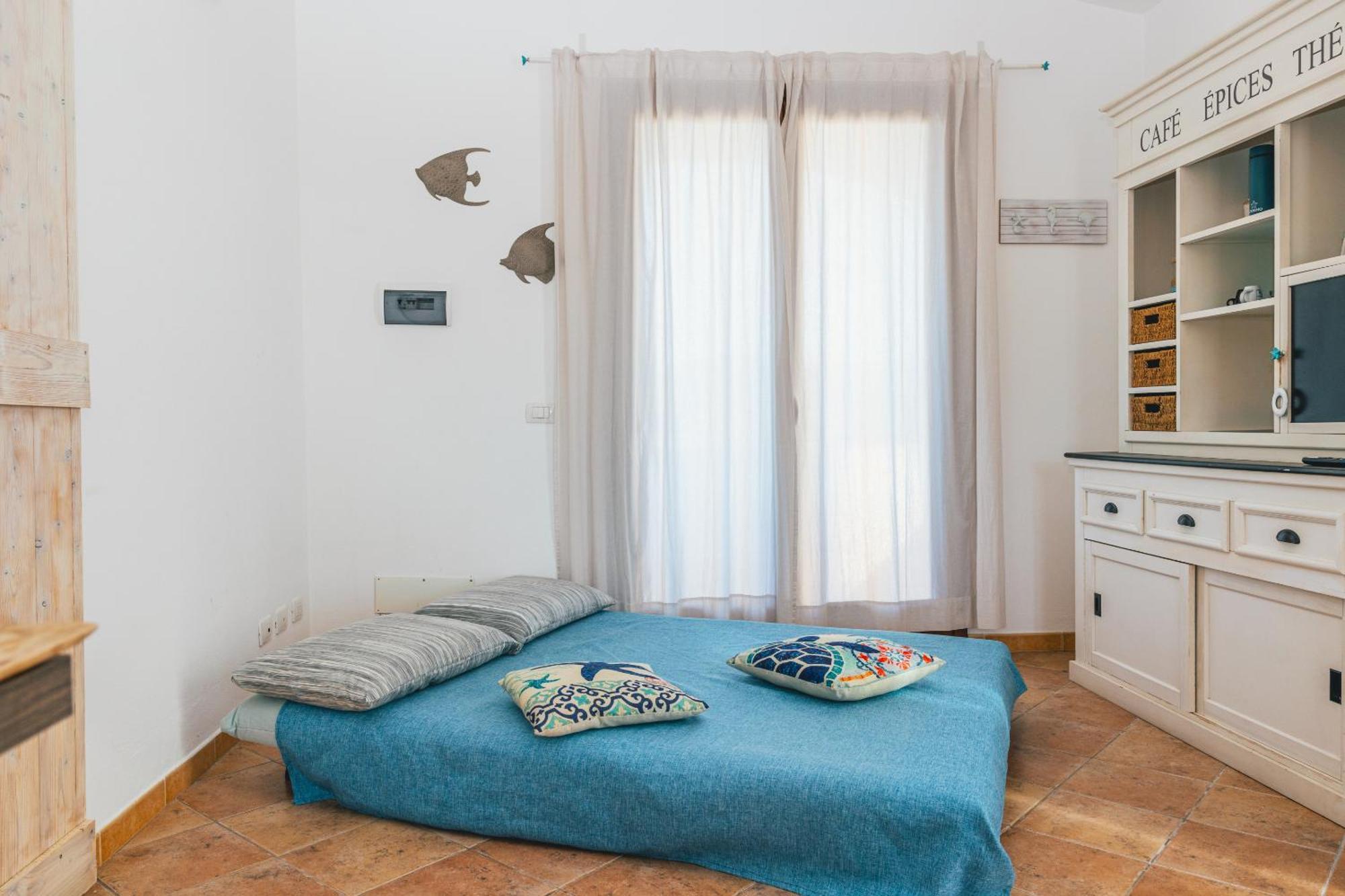 Case Vacanze Il Sogno Porto Pino Exterior photo